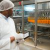Pharmaceutical factory workers in sterile environment PackStation (CAP)