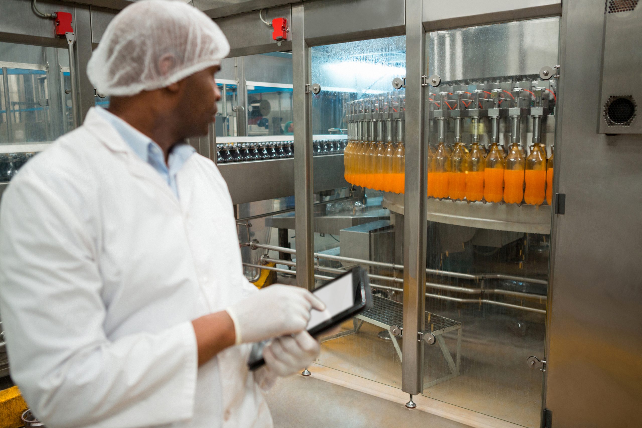 Pharmaceutical factory workers in sterile environment PackStation (CAP)