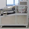 Pharmaceutical factory workers in sterile environment PackStation (FMP)