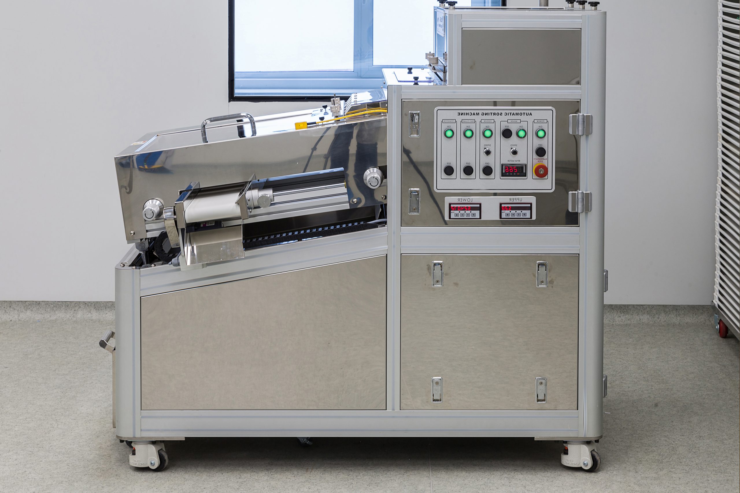 Pharmaceutical factory workers in sterile environment PackStation (FMP)