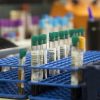 Pharmaceutical factory workers in sterile environment VialSafe