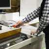 Cropped shot of milling machine operator CartonTracker